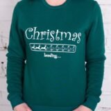 Жіночий зелений утеплений світшот з написом «Christmas Loading...» та зображенням оленів. Женский зеленый утепленный свитшот с надписью «Christmas Loading...» и изображением оленей.