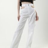 Брюки коттоновые белые "Twins" с высокой посадкой, широкими штанинами и декоративными вырезами на талии. Брюки котонові білі "Twins" з високою посадкою, широкими штанинами та декоративними вирізами на талії.